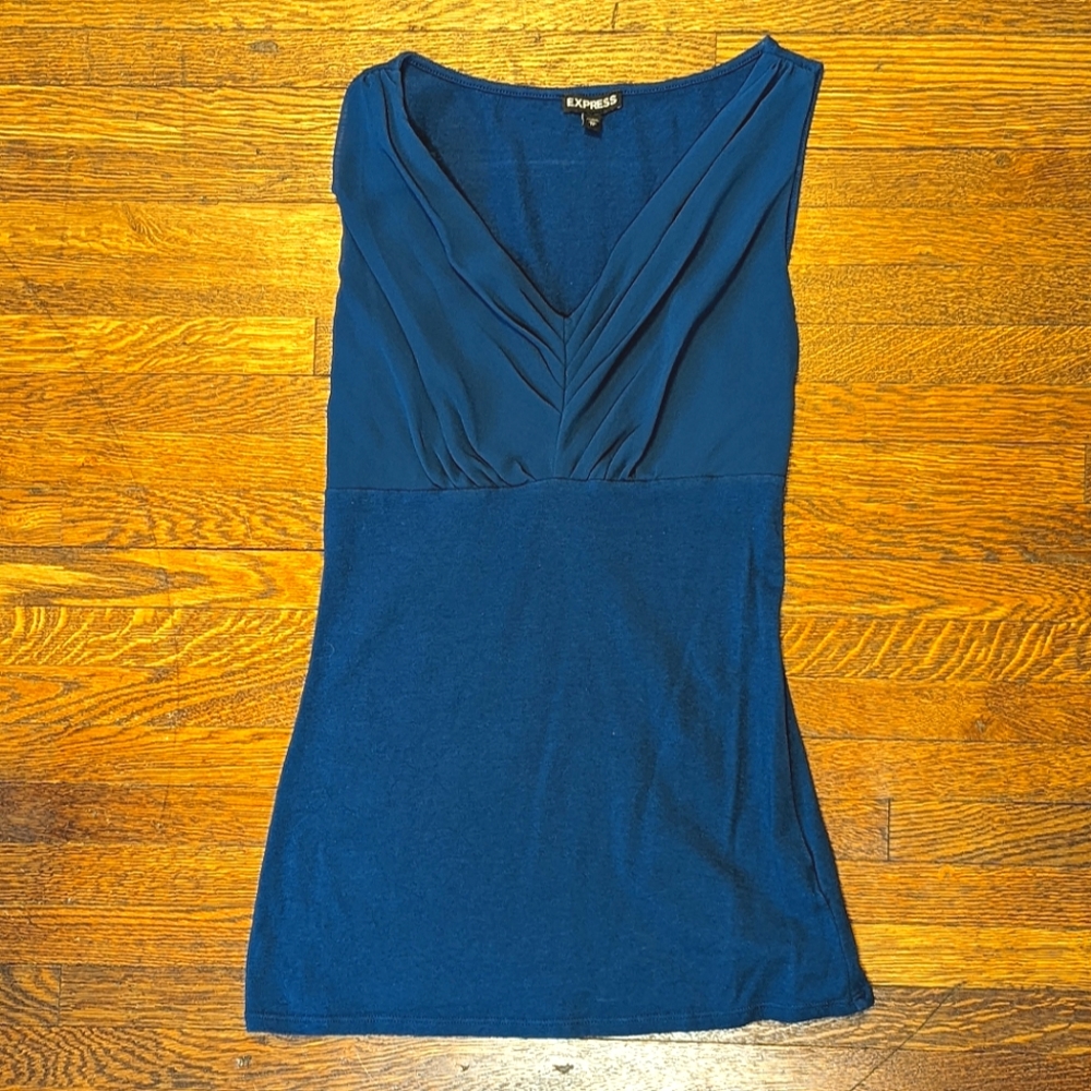 Blue sleeveless blouse